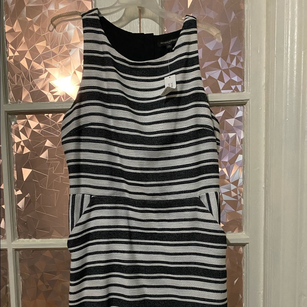 Brand new navy blue and white dress with backout